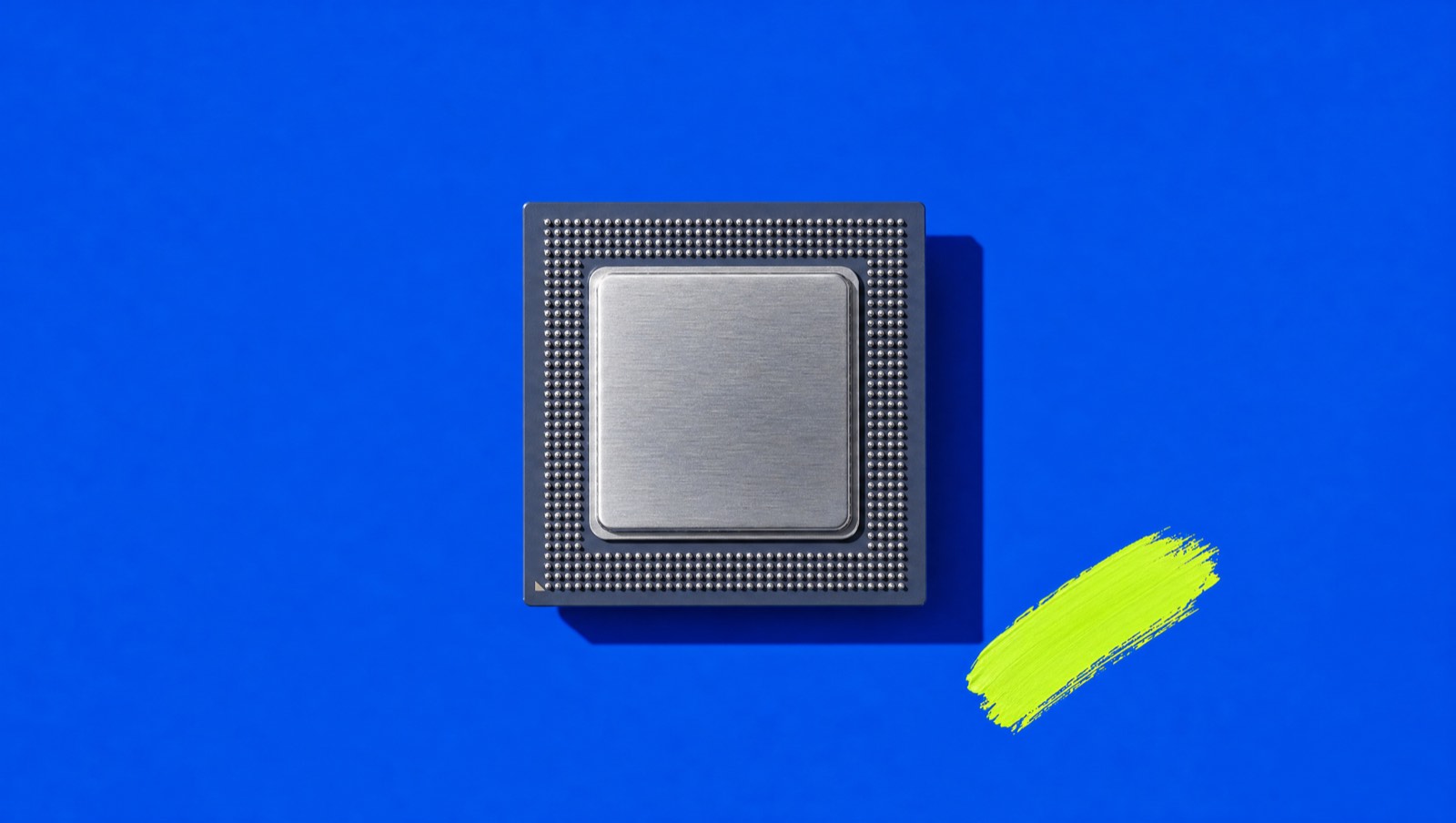 A processor package on cobalt with a chartreuse mark